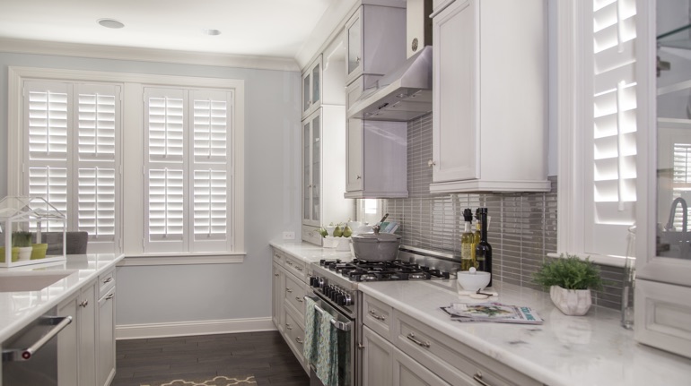 Polywood shutters in Sacramento kitchen with modern appliances.